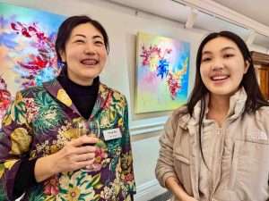 Artist Yang Xu (left) at the Private View, Elemental Exhibition, 6th March 2024